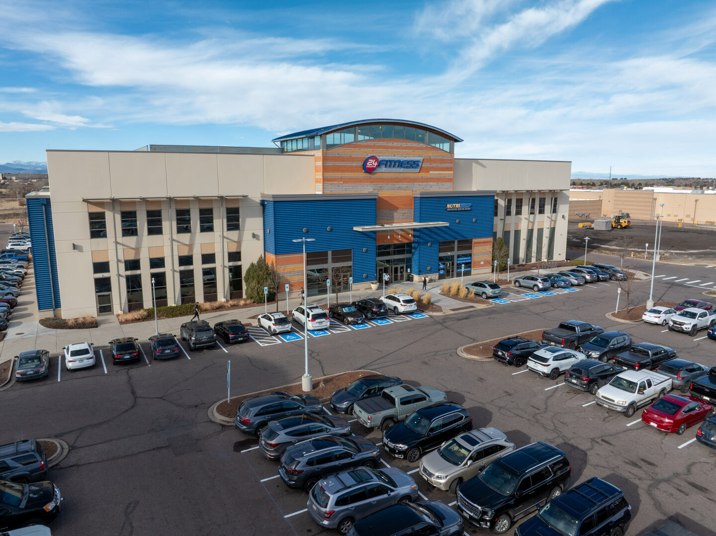 Aerial view of a commercial fitness and retail complex, Colorado Springs