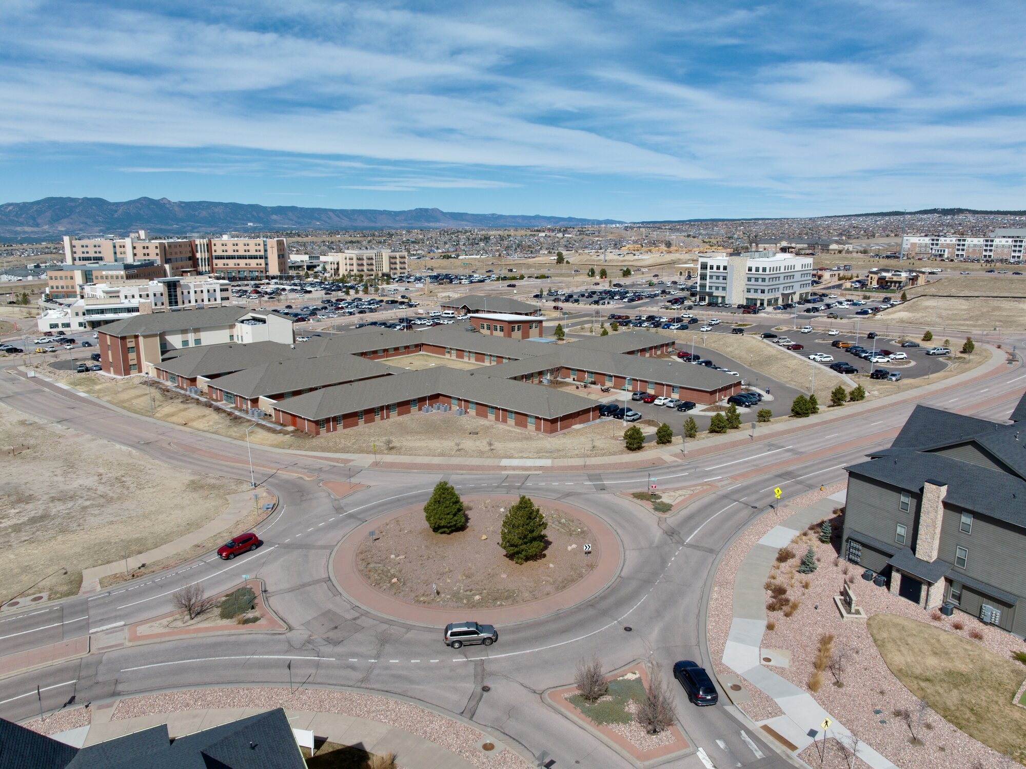 Mixed-use complex with surrounding residential context, Colorado Springs foothills