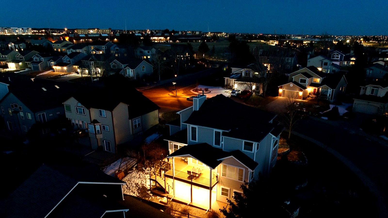 Aerial drone photo of a residential property listing in Colorado Springs